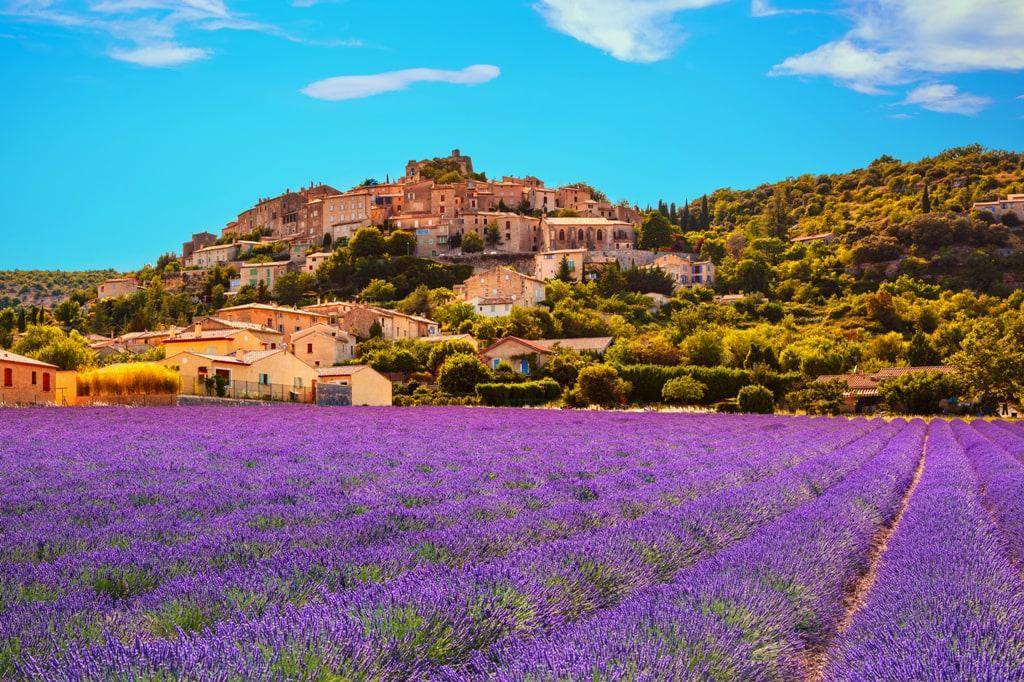 Simiane la Rotonde village and lavender. Provence France Europe min