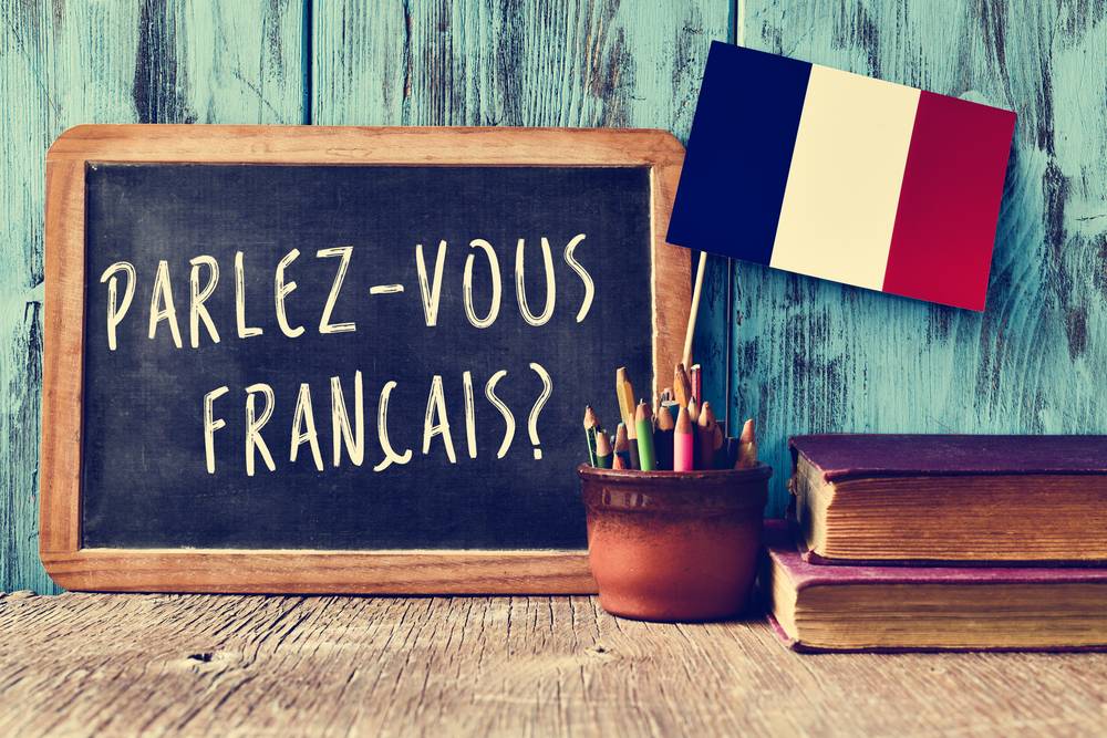 A,Chalkboard,With,The,Question,Parlez vous,Francais?,Do,You,Speak